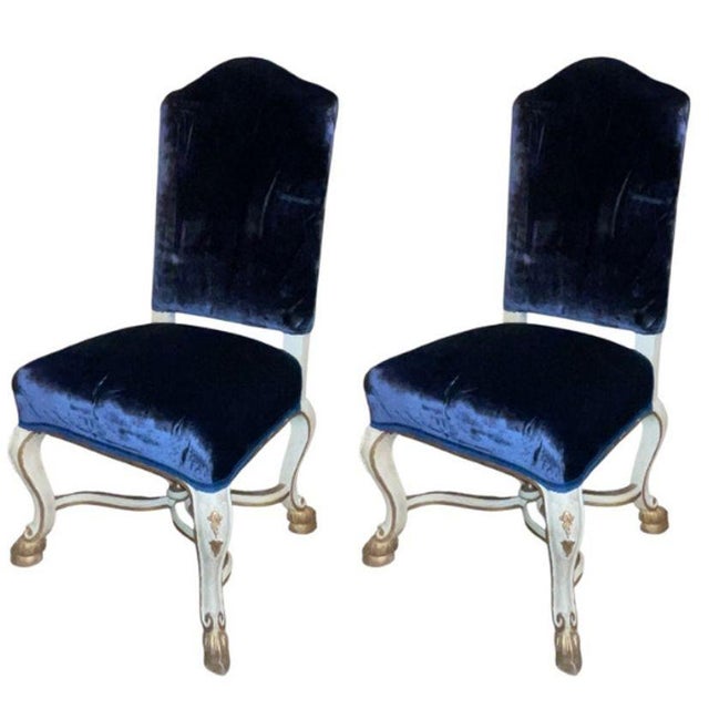 An elegant set of eight Italian early 20th century chairs, dating to the 1920s, finely hand-carved, gilded, and hand-...