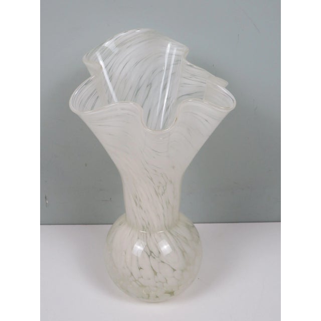 This hand-blown Murano glass vase exemplifies the expressive power of Venetian glass art. Crafted in opaline white with...