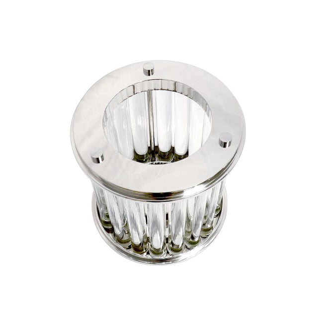 The Lucian hurricane brings art deco style and modern elegance to any room. Featuring a polished chrome finish paired with...