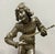 Superb and important pair of silvered bronze sculptures signed A.L. Gaudez, depicting a troubadour musician and an elegant...