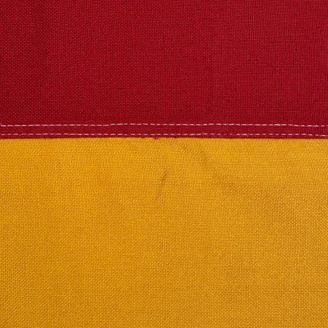 This vintage German flag is fully sewn from a cotton cloth in bold colors. Please note minor staining and other light wear...