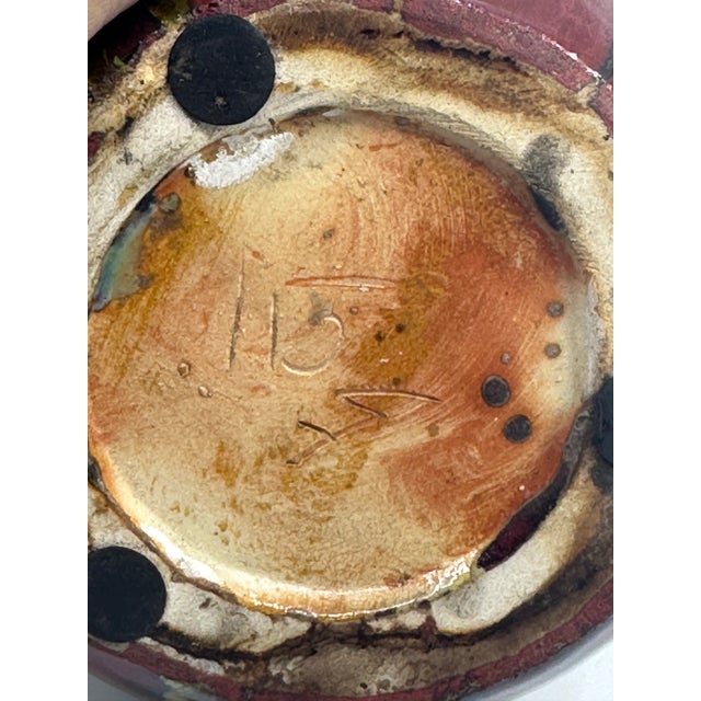 This beautiful vase from Glasser Pottery is a must-have for collectors of mid-century decor. The deep red glaze and...