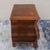 This Louis XV style vintage bombe chest by Henredon features a classic curving shape, bookmatched veneer, dovetailed...