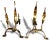 A sparkling pair of gold metal andirons featuring double flame finials. No makers Mark. Dimensions: 12″w x 16″ Condition:...