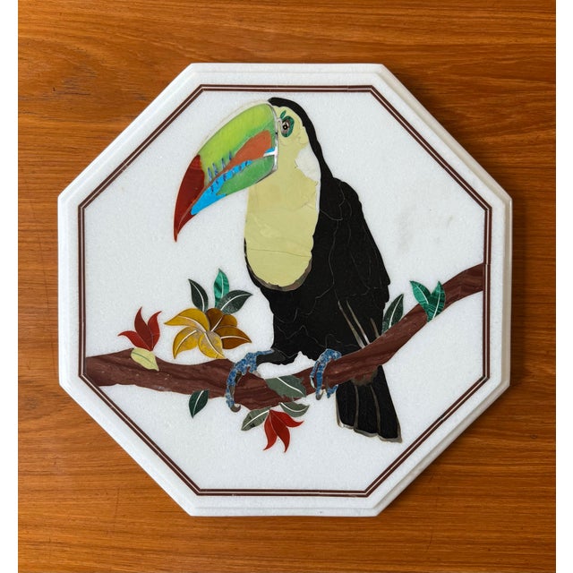 Octagonal marble small table top with a mosaic glass and stone inlay of a toucan bird and tropical foliage. Could be used...
