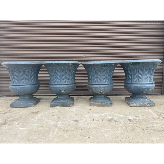 A rare and commanding set of four Neoclassical pedestal urns, recently rescued from a historic South Carolina estate....