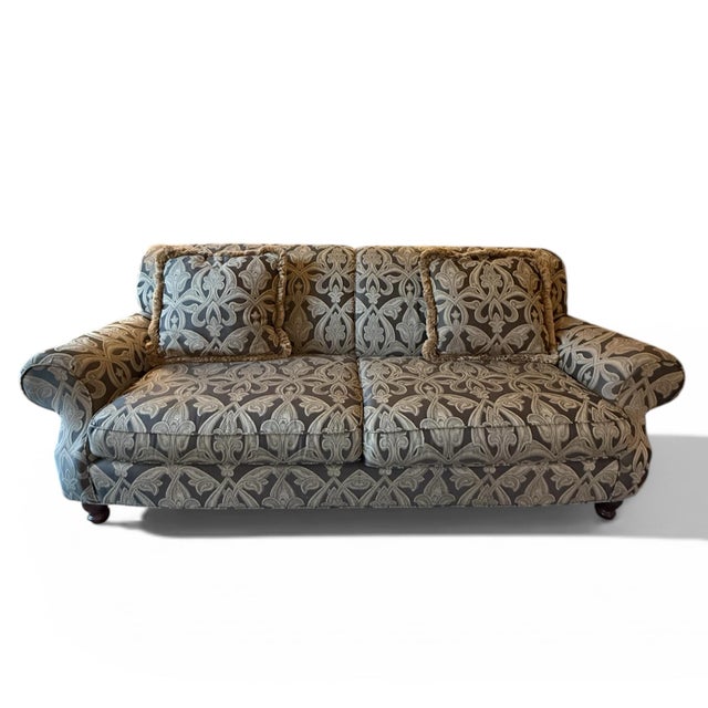 Large and comfortable roll arm sofa made by Thomasville. Classic style and form with oversized rolled arms and back....