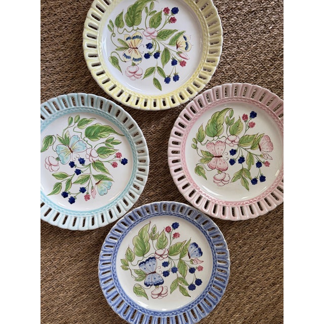 This beautiful set of plates were made in Italy for Horchow! Hand painted with reticulated edges.
