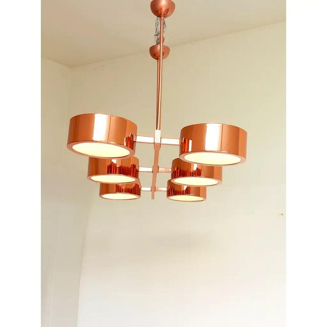 Rectangular Polished Copper Chandelier by Simoeng, in Exhibition Piece conditions. Designed from 2000 Up to 250V...