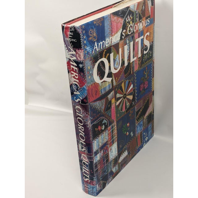 A beautifully illustrated, oversized vintage hardcover edition of America’s Glorious Quilts, edited by Dennis Duke and...