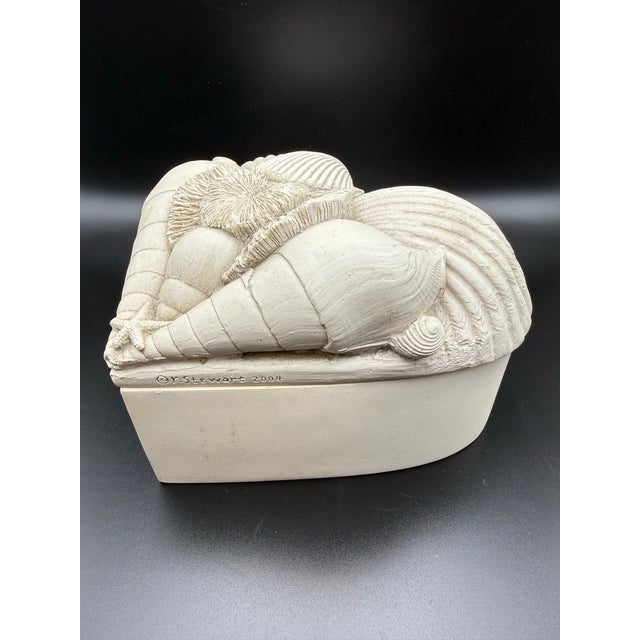 A wonderfully sculptural heart-shaped decorative box by House Parts, Inc., dated 2004. The removable lid is richly modeled...