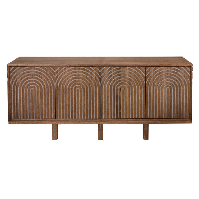 Featuring sleek lines and minimalist hardware, the Ryder Sideboard exudes understated elegance and modern sophistication....