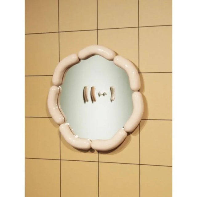 Wurstie mirror by tero kuitunen material: hand built ceramic, glass mirror, wood dimensions: d 49 x w 49 x h 5 cm numbered...
