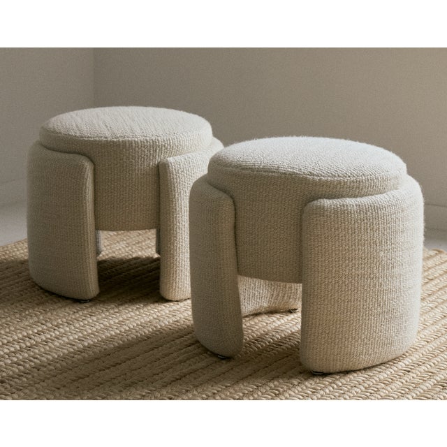Vintage "wrap" pouf, France. This vintage ottoman has been newly reupholstered in a Cowtan & Tout off white textured...