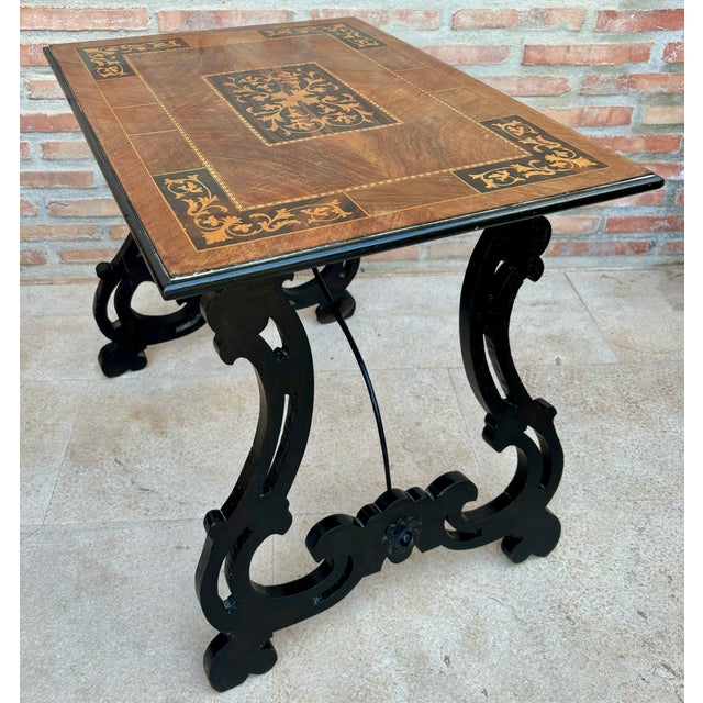 19th century Baroque Spanish side table with marquetry top 19th century Spanish trestle table in walnut. This piece has a...