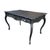 Early 1900s dining/console table stained charcoal-black. Exquisite hand-carved details including goat-hoof feet. Well...