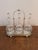 Quality antique Edwardian glass decanters and silver plated stand, having a quality antique Edwardian silver plated stand...