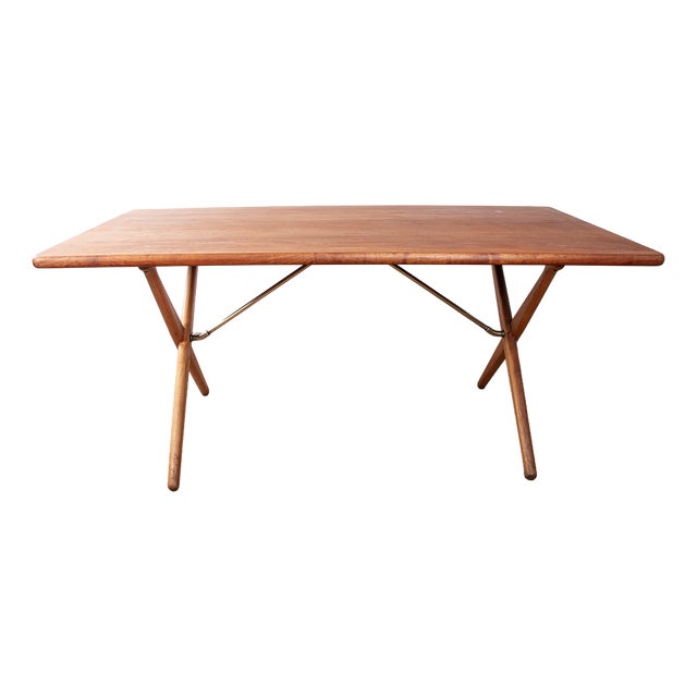 Danish Model at 303 Dining Table in Teak and Beech and Brass by Hans Wegner for Andreas Tuck, 1960 For Sale