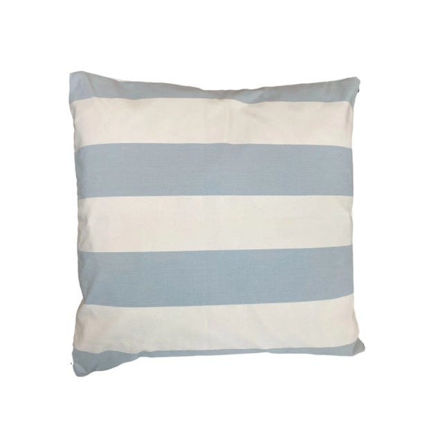 This pillow features an intricate pattern, with thin, alternating stripes and subtle geometric accents in neutral tones,...