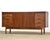 A mid century modern walnut twelve drawer dresser with sliding doors. Professionally refinished. Circa 1960’s. Made in...