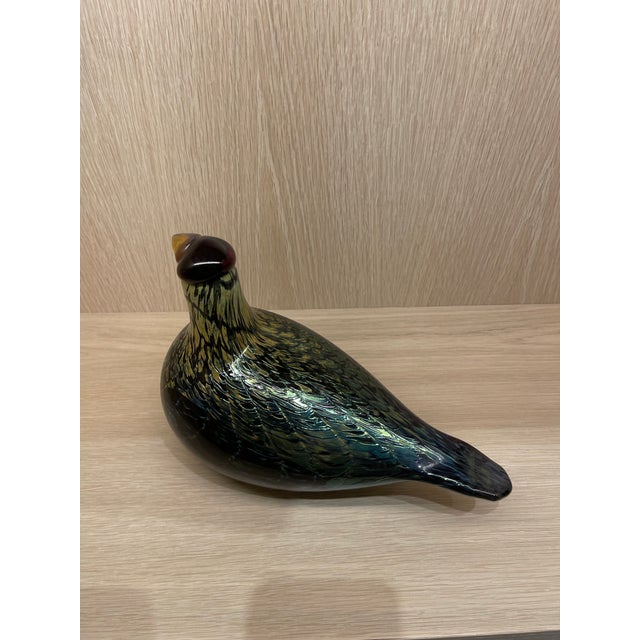 This Oiva Toikka Capercaillie Male Wood Grouse glass bird is handcrafted and mouthblown at the Iittala Glass Factory and...
