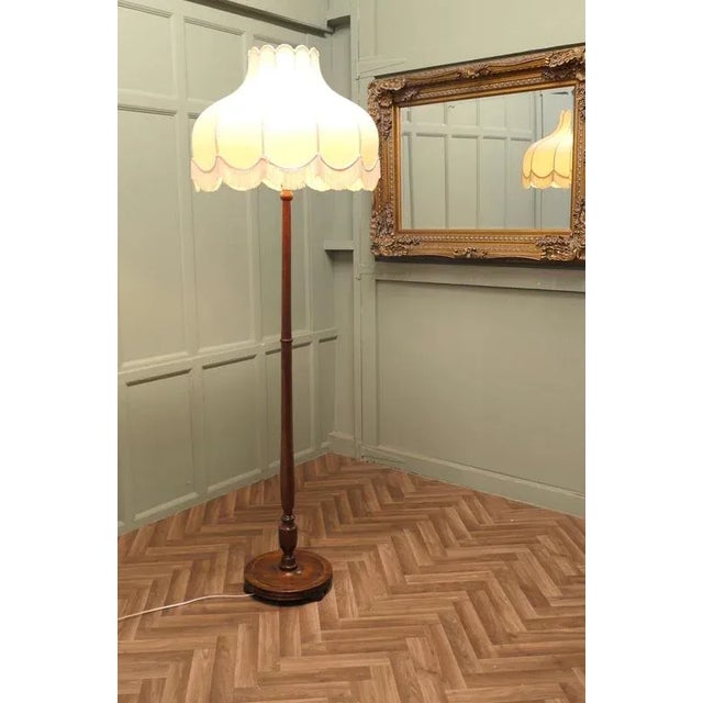 Beech Standard or Floor Lamp with Attractive Linen Shade This is a very stylish piece it has a round turned base and...