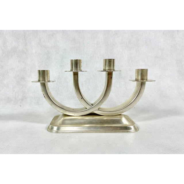 Quist four flames candlestick. West German production from the 1950s from the Esslingen. The item in very good condition...