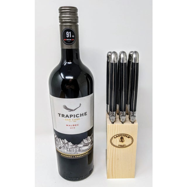 This set of six Laguiole Jean Dubost steak knives with an ebony black resin handle will compliment any table setting. Made...