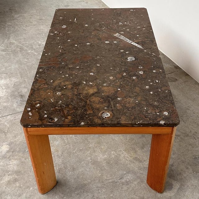 Width: 120 centimeters Height: 50 centimeters Depth: 65 centimeters A striking vintage modernist coffee table dating from...