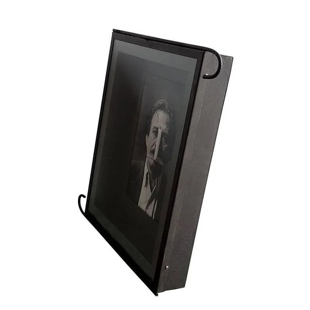 Original black and white photograph of the 1989 with the portrait of the famous artist. Signed by Jannis Kounellis....