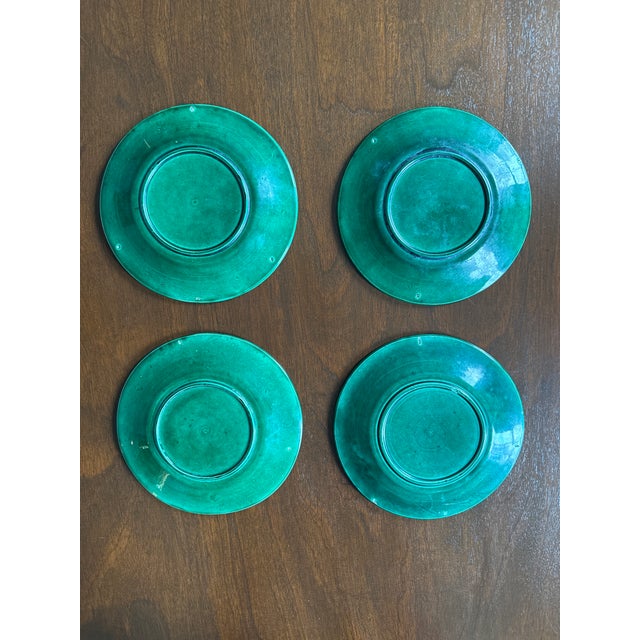 Majolica is having a moment and this set of green plates is perfect for anyone who enjoys majolica and the color green....