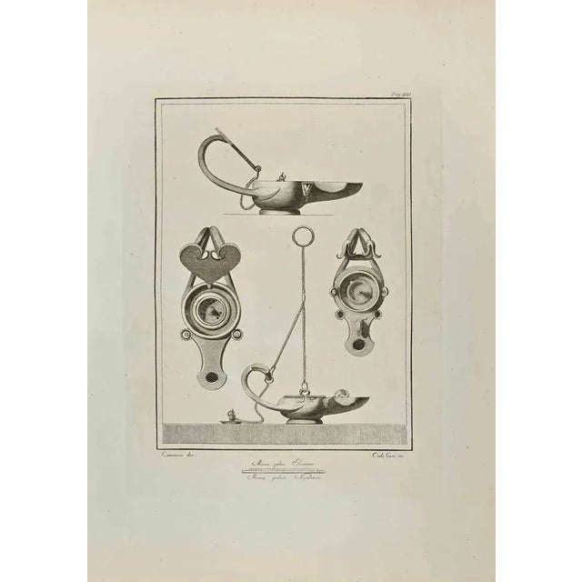 Still Life from "Antiquities of Herculaneum" is an etching on paper realized by Carlo Ceri in the 18th Century. Signed on...