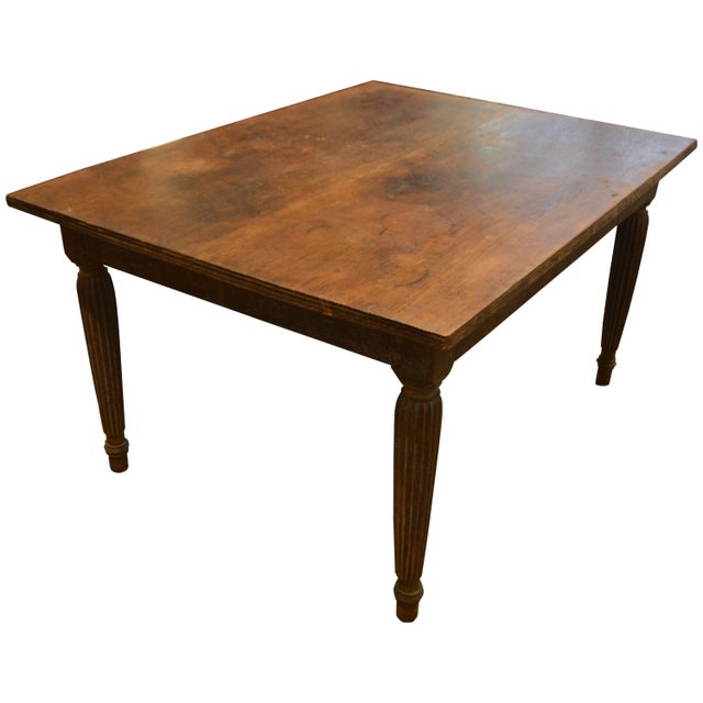 Antique teak dining table with a hand carved bevelled edge and hand carved legs with beautiful patina. Perfect as a dining...