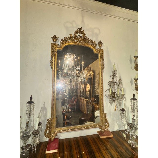 The 19th c. French Louis XVI Giltwood Mirror is an original antique that adds a real touch of luxury. With its intricate...
