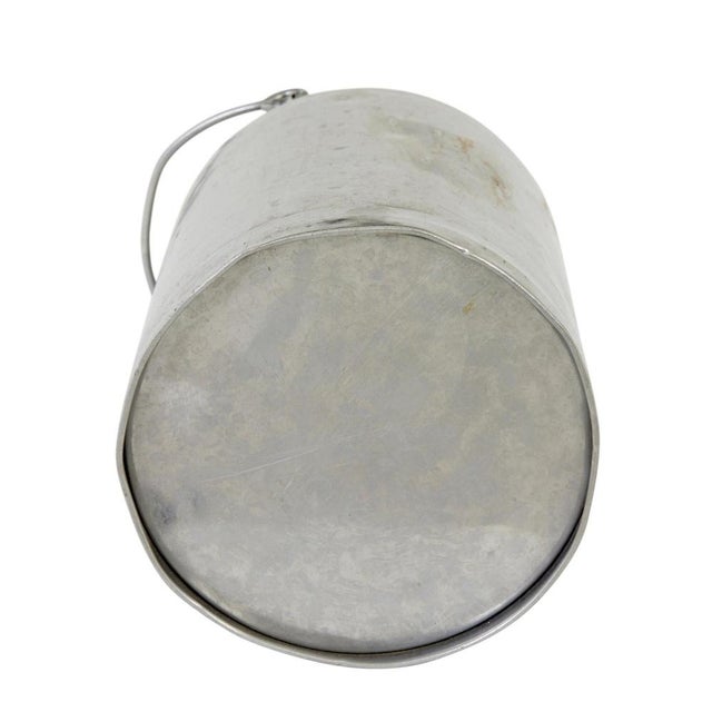 Mid century stainless steel storage vessel circa 1940. Good quality decorative piece, with applied stainless handle, and...
