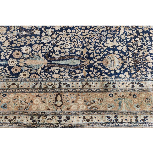 This exquisite Antique Persian Khorassan rug from the early 20th century is a testament to the refinement and artistry of...