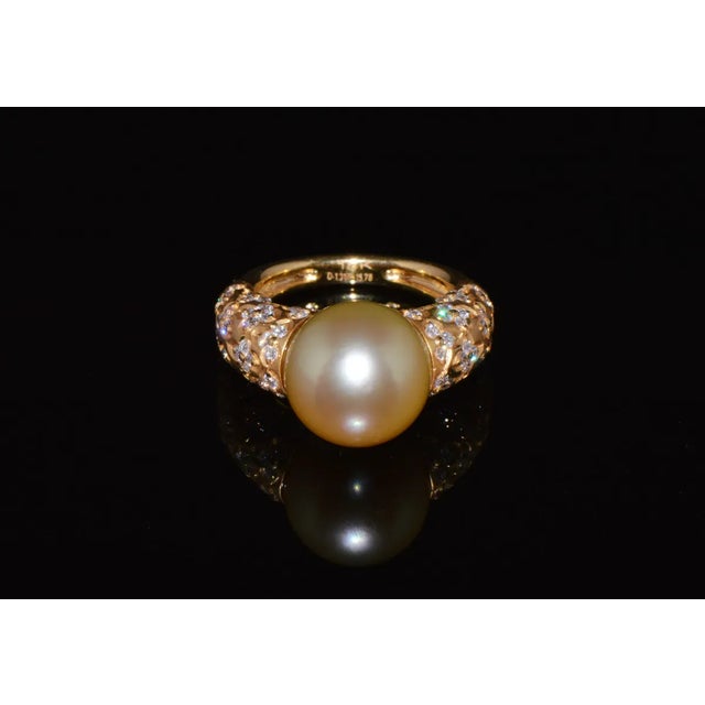Certified natural 17.09CTS diamond and South Sea pearl 18K solid gold ring. This ring features a large 13MM natural South...