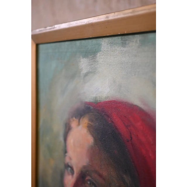 An original pastel on canvas portrait of a woman in a red bonnet by listed American artist Clemente Micarelli b.1929-2008....