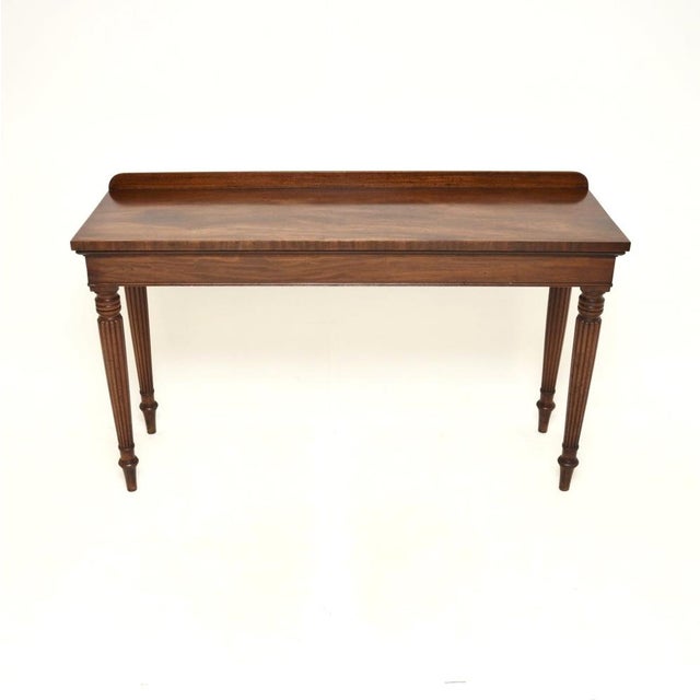 An outstanding large antique Victorian console table, made in England and dating from around the 1840-1850 period. It is...