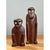This vintage set of two carved figures reduces the human and primate form to bold, simplified geometry, each shaped from a...