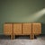 This solid oak graphical sideboard dates to the 1980s. It has four doors with carved patterns applied to both the exterior...