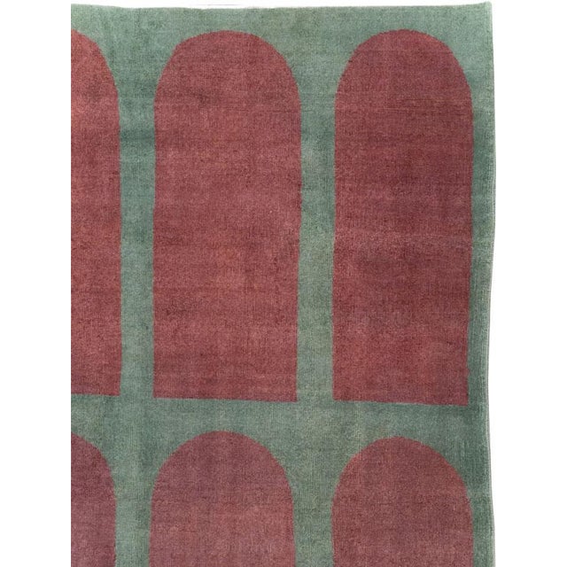 This Mid-20th century Turkish Art Deco Style room-size carpet presents a bold, highly ordered composition of fifteen...