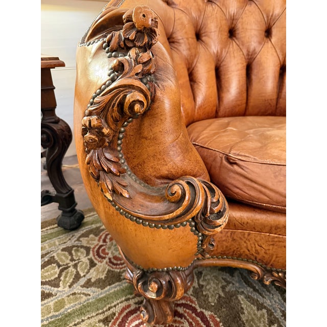 Pair of Antique English Tufted Leather Club Chairs Exceptional pair of antique English leather club chairs dating to the...