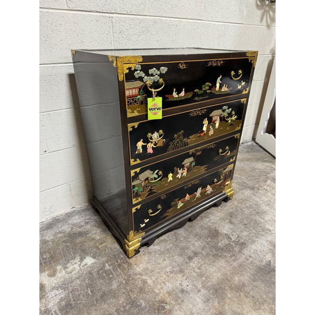 Gorgeous dark ebony stained chest with asian cut out relief scenes. I love the fact that you can see the grain of the wood...