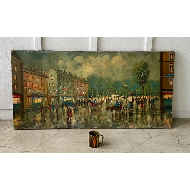 Large vintage Paris France street scene oil painting. Oil on canvas measures 24” x 48”. Signed.