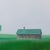 Contemporary Spring Morning by Michael Miller | Oil on Panel of a red barn in a green field with trees For Sale - Image 3 of 5