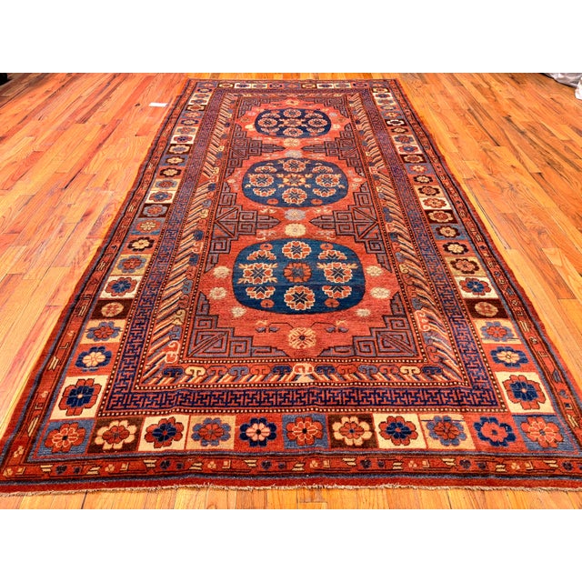 Culturally Rich Antique East Turkestan Khotan Rug, Country of Origin: East Turkestan, Circa Date: Mid-19th Century