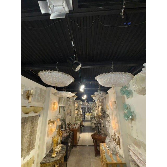 This Murano Gold Granola Glass Flush Mount Chandelier is a stunning addition to any home, adding a touch of elegance and...