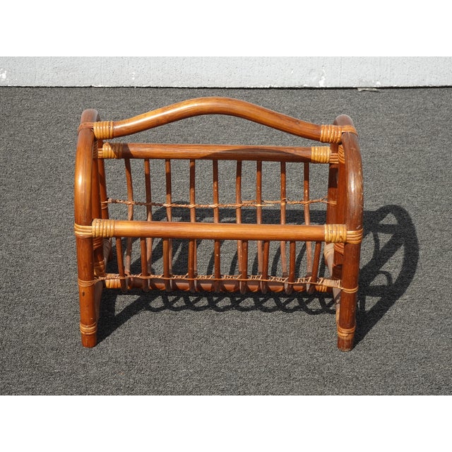 Gorgeous Magazine Rack in Good Vintage Condition. Solid and Firm. There is wear that is usual for its age. Please study...