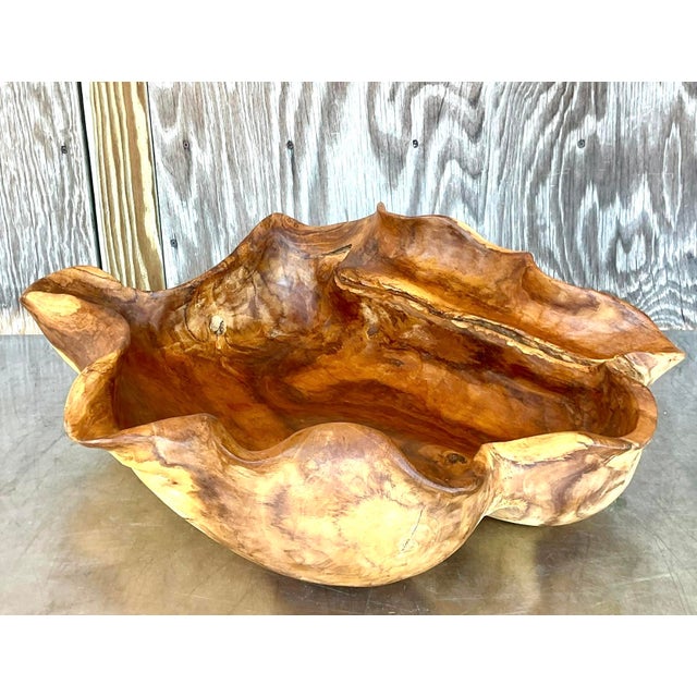 Enhance your home with the Vintage Boho Biomorphic Wooden Bowl. This unique piece features organic shapes and natural wood...